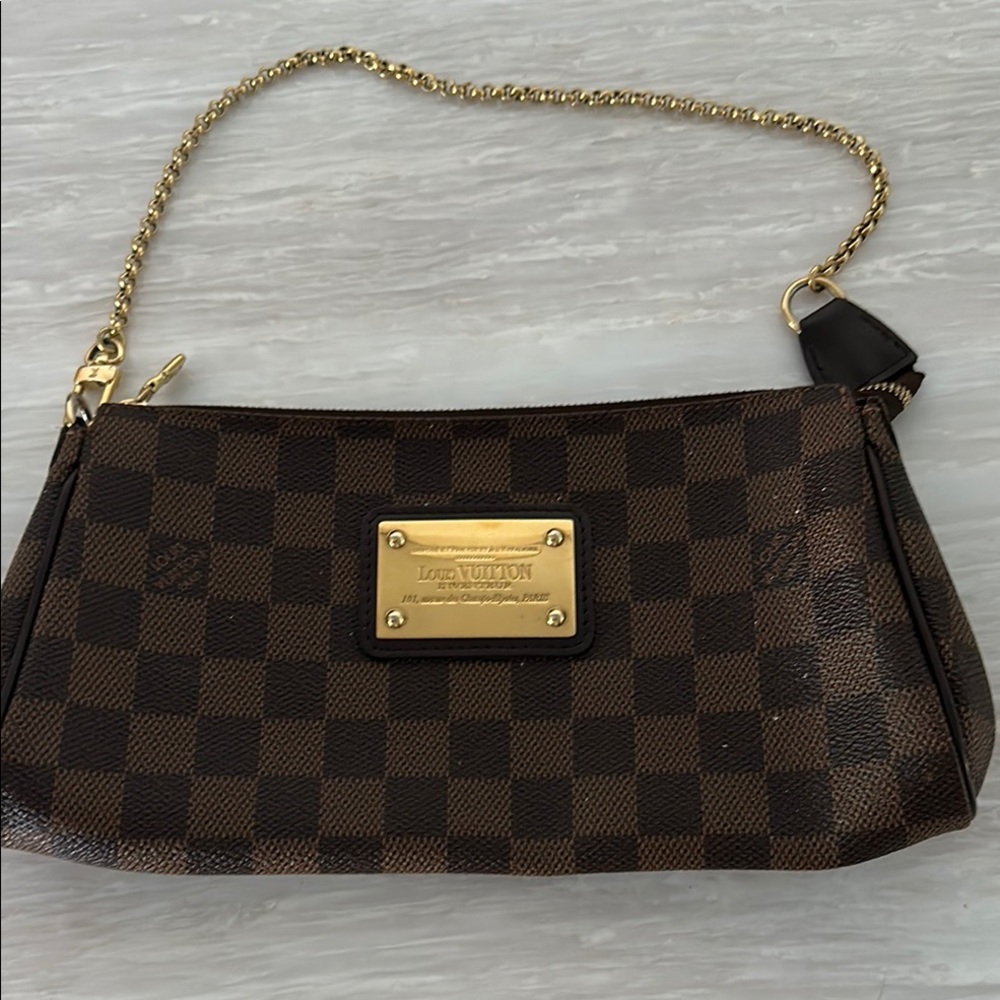 Louis Vuitton Brown Clutch with Gold Accents